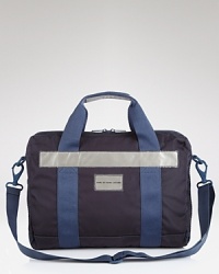 Whether you're walking to work or hopping on your bike, this sporty, versatile messenger bag protects your laptop and other essentials. Whether you're walking to work or hopping on your bike, this sporty, versatile messenger bag protects your laptop and other essentials.