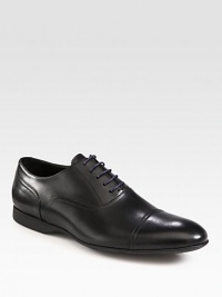 Gleaming Italian leather oxfords classically styled with intricate stitching and a lace-up front. Leather upperLeather liningPadded insoleRubber soleMade in Italy Gleaming Italian leather oxfords classically styled with intricate stitching and a lace-up front. Leather upperLeather liningPadded insoleRubber soleMade in Italy