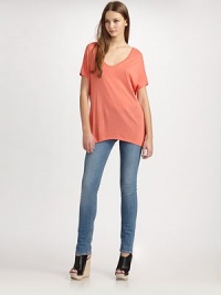 Oversized scoopneck for the girl who appreciates casual wear with a bit of flare. ScoopneckDropped shouldersLonger length hits below the hipsRayonDry cleanImportedModel shown is 5'9½ (176cm) wearing US size Small. Oversized scoopneck for the girl who appreciates casual wear with a bit of flare. ScoopneckDropped shouldersLonger length hits below the hipsRayonDry cleanImportedModel shown is 5'9½ (176cm) wearing US size Small.