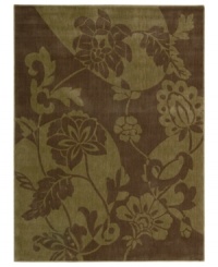 Fresh and contemporary, this attractive rug puts the spotlight on fashionable decor. A cool, casual design of flowers is inverted by stretched circles in two room-changing shades of brown. Woven from a blend of synthetic fibers for exceptional durability and color clarity. Fresh and contemporary, this attractive rug puts the spotlight on fashionable decor. A cool, casual design of flowers is inverted by stretched circles in two room-changing shades of brown. Woven from a blend of synthetic fibers for exceptional durability and color clarity.