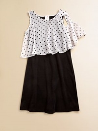 Itsy bitsy polka dots lend personality to a not-so-basic frock with an airy, layered-look bodice.RoundneckSleevelessPullover styleBodice has ruffled hemContrast: 68% polyester/30% rayon/2% spandexSolid: PolyesterHand washMade in USA Itsy bitsy polka dots lend personality to a not-so-basic frock with an airy, layered-look bodice.RoundneckSleevelessPullover styleBodice has ruffled hemContrast: 68% polyester/30% rayon/2% spandexSolid: PolyesterHand washMade in USA
