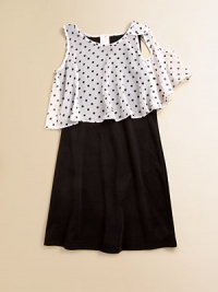 Itsy bitsy polka dots lend personality to a not-so-basic frock with an airy, layered-look bodice.RoundneckSleevelessPullover styleBodice has ruffled hemContrast: 68% polyester/30% rayon/2% spandexSolid: PolyesterHand washMade in USA