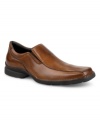 Sophisticated in its simplicity, this modern loafer is crafted in soft, full-grain leather. These men's dress shoes have a bike toe and gore extensions at sides. Rubber sole. Imported.