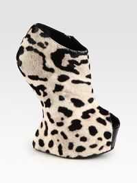 A timeless peep toe completes this leopard-printed calf hair silhouette on a sculpted wedge. Self-covered wedge, 6½ (165mm)Hidden platform, 2 (50mm)Compares to a 4½ heel (115mm)Calf hair upperPeep toeSide zipLeather liningLeather sole with a rubber insertPadded insoleMade in Italy A timeless peep toe completes this leopard-printed calf hair silhouette on a sculpted wedge. Self-covered wedge, 6½ (165mm)Hidden platform, 2 (50mm)Compares to a 4½ heel (115mm)Calf hair upperPeep toeSide zipLeather liningLeather sole with a rubber insertPadded insoleMade in Italy