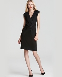 A new angle on suiting, this cap-sleeve MARC BY MARC JACOBS dress features an angled zip to put a structured spin on an hourglass silhouette. A new angle on suiting, this cap-sleeve MARC BY MARC JACOBS dress features an angled zip to put a structured spin on an hourglass silhouette.