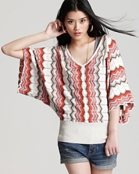 Dramatic kimono sleeves on a Autumn Cashmere sweater go hand-in-hand with bold zigzag stripes. Pair it with cool cutoffs for the perfect weekend look. Dramatic kimono sleeves on a Autumn Cashmere sweater go hand-in-hand with bold zigzag stripes. Pair it with cool cutoffs for the perfect weekend look.