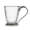 Mouth-blown glass is accented with a delicate pewter beaded rim to create this graceful mug from Arte Italica.