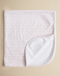 Crafted in super soft pima cotton, this cuddly blanket from Kissy Kissy is decorated with heart print on one side, and a solid color on the reverse. Crafted in super soft pima cotton, this cuddly blanket from Kissy Kissy is decorated with heart print on one side, and a solid color on the reverse.