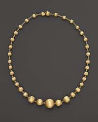 Gorgeously textured beads of 18K yellow gold gleam richly on this necklace from the Africa Collection. Gorgeously textured beads of 18K yellow gold gleam richly on this necklace from the Africa Collection.