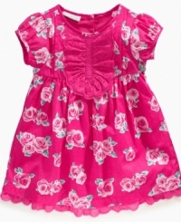 Give her a rosy disposition with this lovely eyelet-detailed dress from First Impressions. Give her a rosy disposition with this lovely eyelet-detailed dress from First Impressions.