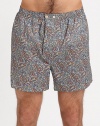 A rich, paisley print is shaped in lightweight, breathable cotton for the true gentleman who indulges in style.Elastic waistbandAdjustable button-flyInseam, about 4CottonMachine washImported