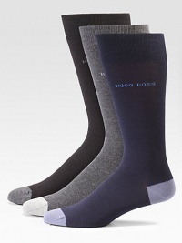 Lightweight and breathable solid dress socks with logo detail and heel and toe contrast, finished in a smooth, stretch cotton blend.Set of 3Mid-calf height75% cotton/23% polyesteramide/2% elastaneMachine washImported Lightweight and breathable solid dress socks with logo detail and heel and toe contrast, finished in a smooth, stretch cotton blend.Set of 3Mid-calf height75% cotton/23% polyesteramide/2% elastaneMachine washImported
