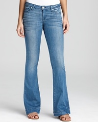 Boasting a light wash and flared leg, these Hudson jeans will have you looking easy-chic all season. Boasting a light wash and flared leg, these Hudson jeans will have you looking easy-chic all season.