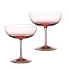 Dipping her brush in a palette of blush, designer Monique Lhuillier created this keepsake set of champagne coupes to celebrate life's special moments. Each is detailed with classic Waterford cuttings along the base.
