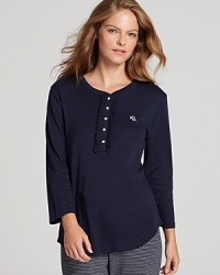 Lauren Ralph Lauren adds a feminine touch to this classic lounge top with a front ruffle and three-quarter sleeves.