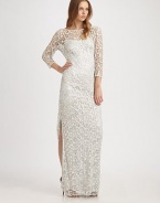 Shimmering metallic lace, in an evening-perfect floor-length silhouette.BoatneckThree-quarter sleevesSide slitV back with concealed zipFully linedAbout 43 from natural waist97% polyester/3% spandexDry cleanImportedModel shown is 5'9½ (177cm) wearing US size 4. 