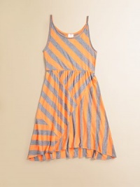 A simple knit frock gets a striking update with bold, contrasting stripes and an uneven hem.ScoopneckSleevelessPullover styleTie-back waistHem is short in the front and long in the back80% rayon/20% polyesterHand washMade in the USA of imported fabric A simple knit frock gets a striking update with bold, contrasting stripes and an uneven hem.ScoopneckSleevelessPullover styleTie-back waistHem is short in the front and long in the back80% rayon/20% polyesterHand washMade in the USA of imported fabric