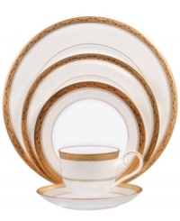 Noritake makes any occasion memorable with the opulent grace of Odessa Gold dinnerware. Wide bands of etched gold and pale gray with delicate blooms adorn this classic bone china place setting. Noritake makes any occasion memorable with the opulent grace of Odessa Gold dinnerware. Wide bands of etched gold and pale gray with delicate blooms adorn this classic bone china place setting.