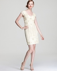 Intricately detailed, Sue Wong's elaborate dress showcases delicate beading and allover embroidery. A sheer back lightens this utterly glamorous look. Intricately detailed, Sue Wong's elaborate dress showcases delicate beading and allover embroidery. A sheer back lightens this utterly glamorous look.