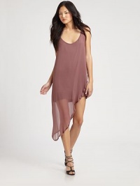 Semi-sheer silk chiffon overlay with a dramatic asymmetrical hem rests upon a reversible mini. ScoopneckSleevelessAsymmetrical hemReversible tank dress includedSilkDry cleanImported of American fabricModel shown is 5'10 (177cm) wearing US size Small. Semi-sheer silk chiffon overlay with a dramatic asymmetrical hem rests upon a reversible mini. ScoopneckSleevelessAsymmetrical hemReversible tank dress includedSilkDry cleanImported of American fabricModel shown is 5'10 (177cm) wearing US size Small.