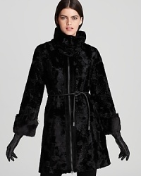 Give winter looks a plush finish with this timeless Laundry by Shelli Segal faux fur coat with infinity scarf for added warmth--and style. Give winter looks a plush finish with this timeless Laundry by Shelli Segal faux fur coat with infinity scarf for added warmth--and style.