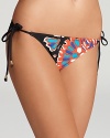 A minimalist silhouette lends maximum impact to this strikingly-patterned Trina Turk triangle bikini bottom.