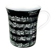 Whimsical drinkware to add fun and color to the table. Konitz mugs feature the highest quality color and glaze. White text of a piece of music on black ground.
