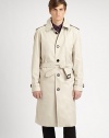 Burberry's classic all-weather essential, impeccably tailored in a single-breasted trench style.Point collarEpaulettesRaglan sleevesBuckle-strap cuffsButton-frontSlash pocketsBack shoulder ventInverted back pleat below waistAbout 44 from shoulder to hem65% polyester/35% cottonFully linedDry cleanMade in Italy