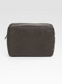 Travel with style and sophistication with this travel case crafted in signature woven Italian calfskin leather.Zip closureLeather7½W x 4¼H x 1¾DMade in Italy Travel with style and sophistication with this travel case crafted in signature woven Italian calfskin leather.Zip closureLeather7½W x 4¼H x 1¾DMade in Italy