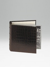 Crafted of crocodile-embossed Italian calfskin, this handsome design is the perfect way to store and display treasured photos. 18 clear pocket leaves hold 36, 4 X 6 photos 5½ X 6¾ Made in USA