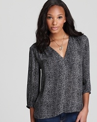 Add a hint of the exotic to your work-to-weekend wardrobe with this Joie top, emblazoned with an animal print. Add a hint of the exotic to your work-to-weekend wardrobe with this Joie top, emblazoned with an animal print.