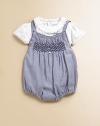 Classic stripes and a pretty smocked bodice add a splash of color to this charming bodysuit.Straight necklineStraps with back button closureSmocked bodiceBottom snapsCottonMachine washImported Please note: Number of snaps may vary depending on size ordered. 