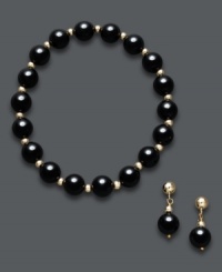 A bold, new look. Black onyx beads (8 mm) and 14k gold beaded accents adorn this matching jewelry set. Wear the stretch bracelet and drop earrings separate or together for a dramatically-stylish look. Approximate bracelet diameter: 3-1/2 inches. Approximate earring drop: 3/4 inch. A bold, new look. Black onyx beads (8 mm) and 14k gold beaded accents adorn this matching jewelry set. Wear the stretch bracelet and drop earrings separate or together for a dramatically-stylish look. Approximate bracelet diameter: 3-1/2 inches. Approximate earring drop: 3/4 inch.