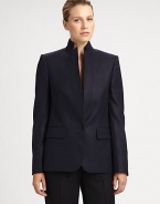 This crisp, sophisticated wool style is finished with a stand collar and unique inverted lapels.Stand collarInverted lapelsButton closureFlap pocketsButton cuffsBack ventAbout 26 from shoulder to hemWoolDry cleanMade in Italy of imported fabricModel shown is 5'11 (180cm) wearing US size 4. Additional Information Women's Premier Designer & Contemporary Size Guide 