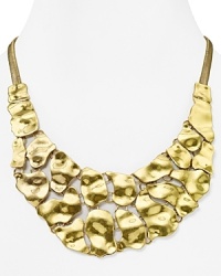 Let RJ Graziano lend your neckline a hit of goddess-inspired glamor with this hammered disc necklace. With a bold, layered design, it makes a striking focal point. Let RJ Graziano lend your neckline a hit of goddess-inspired glamor with this hammered disc necklace. With a bold, layered design, it makes a striking focal point.