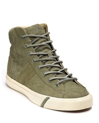 An updated hi-top sneaker, rendered in luxuriously soft nubuk leather, leather laces and camouflage lining. An updated hi-top sneaker, rendered in luxuriously soft nubuk leather, leather laces and camouflage lining.