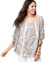 A printed poncho-style top adds relaxed elegance to any outfit! Try Style&co.'s top with your favorite shorts and capris.