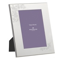 The Lace Bouquet frames feature a charming embossed technique on silver plate in Vera Wang's best-selling pattern, Vera Lace. Available in three sizes, the Lace Bouquet frames make a beautiful gift. Each frame is presented in Vera Wang's signature gift box. The Lace Bouquet frames feature a charming embossed technique on silver plate in Vera Wang's best-selling pattern, Vera Lace. Available in three sizes, the Lace Bouquet frames make a beautiful gift. Each frame is presented in Vera Wang's signature gift box.