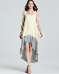This BCBGeneration high/low dress works the color-block trend in muted tones for a fresh twist on the season's most beloved trend. This BCBGeneration high/low dress works the color-block trend in muted tones for a fresh twist on the season's most beloved trend.