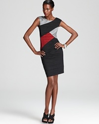 Aidan Mattox goes modern with this fashion-forward essential--bold color blocking takes form in asymmetric paneling and subtle texture. Aidan Mattox goes modern with this fashion-forward essential--bold color blocking takes form in asymmetric paneling and subtle texture.