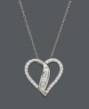 Celebrate your love in style with this elegant heart pendant by Wrapped in Love™. Crafted in 14k white gold, open heart-shaped necklace features sparkling round-cut diamonds (1/2 ct. t.w.). Approximate length: 18 inches. Approximate drop: 7/8 inch.