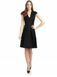 THE LOOKDeep v-neckExposed back zip closureCap sleevesFitted through waistPleated skirtTHE FITAbout 38 from shoulder to hemTHE MATERIAL89% wool/9% polyamide/2% elastaneFully linedCARE & ORIGINDry cleanMade in ItalyModel shown is 5'9½ (176cm) wearing US size 4. THE LOOKDeep v-neckExposed back zip closureCap sleevesFitted through waistPleated skirtTHE FITAbout 38 from shoulder to hemTHE MATERIAL89% wool/9% polyamide/2% elastaneFully linedCARE & ORIGINDry cleanMade in ItalyModel shown is 5'9½ (176cm) wearing US size 4.