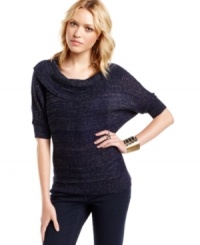 So many reasons to love this sweater from Cotton Emporium! From the festive metallic threading to the oversized cowl collar, this dolman sleeve number makes us giddy about cold-weather style. So many reasons to love this sweater from Cotton Emporium! From the festive metallic threading to the oversized cowl collar, this dolman sleeve number makes us giddy about cold-weather style.