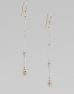 Gracefully dangling strands of sterling silver chain, sprinkled and tipped with glowing faceted beads of 14k gold.14k yellow gold and sterling silverLength, about 2¼Ear wireMade in USA