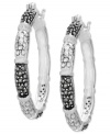 Genevieve & Grace sets an elegant tone. Its hoop earrings, set in sterling silver, dazzle with marcasite and crystals for a stylish statement. Approximate diameter: 1-1/2 inch.