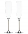 Like a posh necklace, the elegant Jubilee Pearl toasting flutes from Lenox are the must-have accessory for an evening of luxury. A slender silhouette, white pearls and shiny silver plate combine for celebration-worthy style.