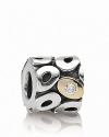 Oxidized and polished silver ovals set off a 14K gold accents with a sparking cubic zirconia stones. Charm by PANDORA.