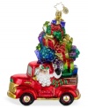 Honk, honk! Santa's Express, with St. Nick in the driver's seat, goes direct to your house with a mound of presents atop a ruby red truck in this Presents for Pickup ornament. Hand-painted from Christopher Radko.
