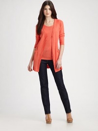 A fashion classic, this sweater offers an elongated silhouette, timeless style and luxurious linen fabrication. Button closureThree-quarter sleevesRibbed trimFront pocketsAbout 31 from shoulder to hemLinenHand washImported of Italian fabric Model shown is 5'10 (177cm) wearing US size Small. A fashion classic, this sweater offers an elongated silhouette, timeless style and luxurious linen fabrication. Button closureThree-quarter sleevesRibbed trimFront pocketsAbout 31 from shoulder to hemLinenHand washImported of Italian fabric Model shown is 5'10 (177cm) wearing US size Small.