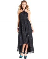 GUESS decks out this dress with a halter neckline, high-low hem and a gorgeous print that's a cross between cosmic and paint splatter. GUESS decks out this dress with a halter neckline, high-low hem and a gorgeous print that's a cross between cosmic and paint splatter.